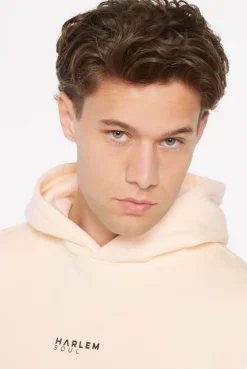 ELY-AS Hoodie Unisex mit Backprint cream