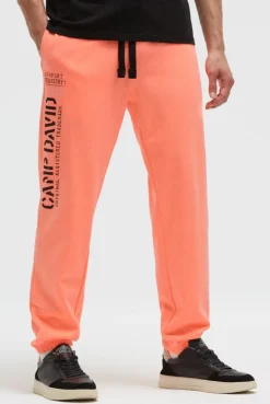 Jogginghose mit Logo Print speed orange neon