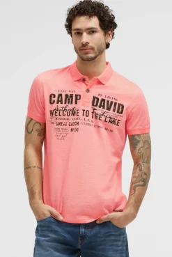 Kurzarmpolo Oil Dyed mit Logo Print neon flame