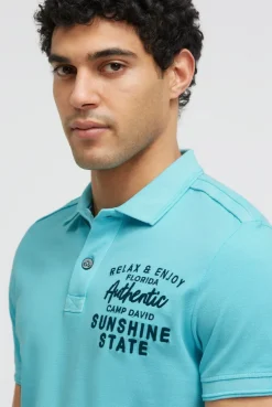 Pikee-Polo Kurzarm mit Rücken-Stickerei aqua