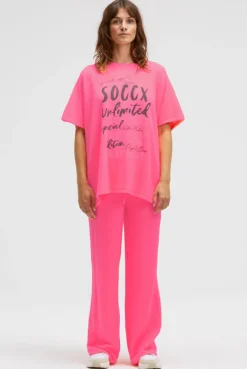 Poncho aus Flauschstrick mit Glimmer Print neon pink