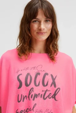 Poncho aus Flauschstrick mit Glimmer Print neon pink