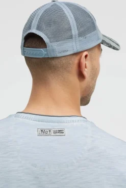 Trucker Cap mit All Over Print und Patch silver blue