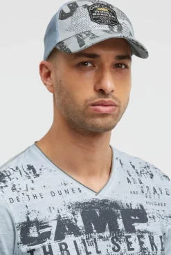 Trucker Cap mit All Over Print und Patch silver blue